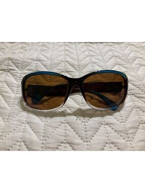 Foster Grant Sunglasses with Brown Lenses and Blue Accents